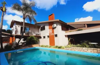 Casa para venda 4 dormitórios sendo 1 suíte, piscina situada no bairro camobi na
