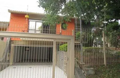 Casa com 4 quartos à venda na Rua Delfino Riet, Santo Antônio, Porto Alegre