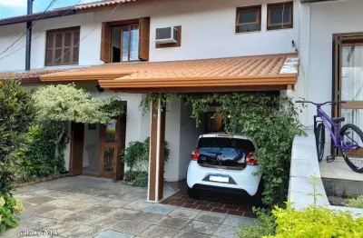 Casa com 3 quartos à venda na Avenida Eduardo Prado, Cavalhada, Porto Alegre