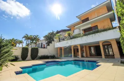 Casa de alto padrão em condomínio isaura 600 m² com piscina, área gourmet e 5 suites