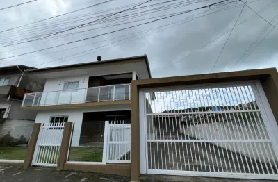 Apartamento junto ao centro de garopaba proximo a comercios .