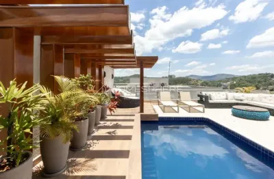 Casa de condomínio com 464 m², 4 suítes , piscina e studio acústico