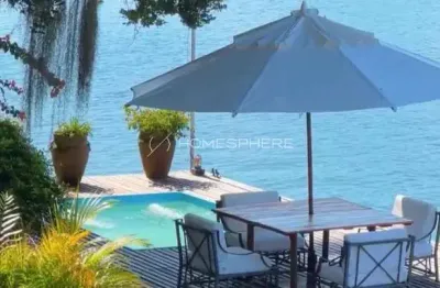 Casa na ilha do cavaco em angra dos reis com apto. de apoio no continente.