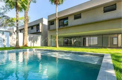 Casa de condomínio com 4 suítes e 6 vagas no alto da boa vista!