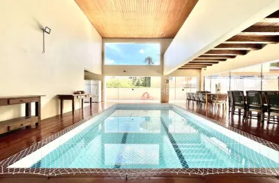 Casa em aldeia da serra , semiplana,4 suítes,piscina e varanda gourmet .