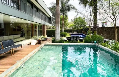 Casa a venda em aldeia da serra, com vista para o lago, 4 suítes, piscina e muito design .