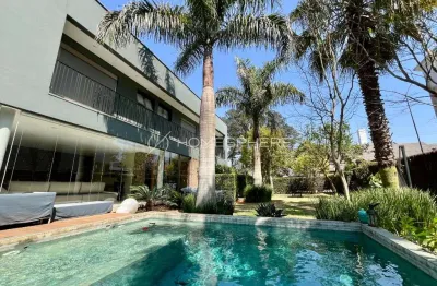 Casa condomínio aldeia da serra com  644 m², piscina vista pro lago
