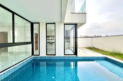 Casa nova em aldeia da serra com 4 suítes , piscina e vista panorâmica permanente .