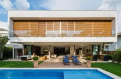Residência contemporânea com vista para a mata no alphaville conde ii – projeto nitsche arquitetos