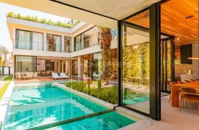 Mansão de luxo à venda no tamboré 2 com 6 suítes, rooftop panorâmico e cinema