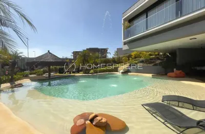 Casa de luxo à venda no residencial itahyê alphaville com 4 suítes e piscina natural de 100m²