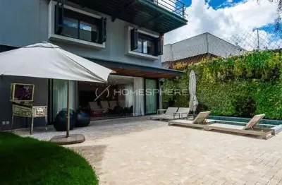 Residência contemporânea, imponente e totalmente automatizada, localizada em uma das ruas mais desejadas do Jardim Paulista, a poucos minutos do Parque Ibirapuera