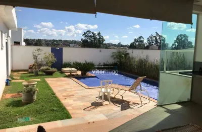 Casa com 4 dormitórios à venda, 447 m² por r$ 4.200.000,00 - condomínio reserva do vale - morada da colina - uberlândia/mg