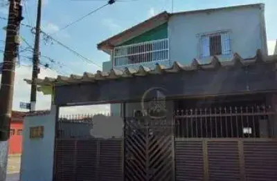 Sobrado com 4 dormitórios à venda, 262 m² por R$ 550.000,00 - Maracanã - Praia Grande/SP