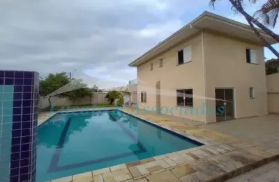 Sobrado no balneario florida, praia grande sp, sendo 04 dormitorios, 02 suites, 04 vagas, 03 banheiros, piscina, quintal com churrasqueira, fogão de l