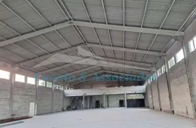 Galpão com 1.018,50 m² com mezanino de 206,85 m² totalizando 1225,35 m². com 10 vagas na frente. com 04 banheiros sendo 02 no mezanino.