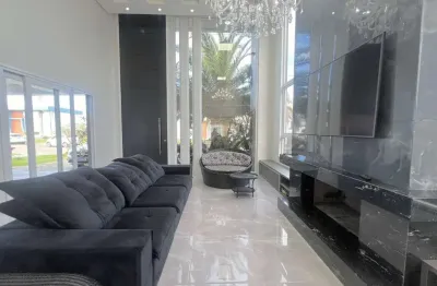 Casa em condomínio fechado com 4 quartos à venda na rua onório germano, 2009, araça, capão da canoa, 200 m2 por r$ 1.590.000