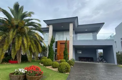 Casa em condomínio fechado com 5 quartos à venda na avenida jaçanã, 951, atlântida, xangri-lá, 375 m2 por r$ 3.700.000