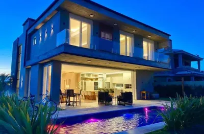 Casa em condomínio fechado com 6 quartos à venda na avenida paraguassu, 19, marina, xangri-lá, 320 m2 por r$ 3.950.000