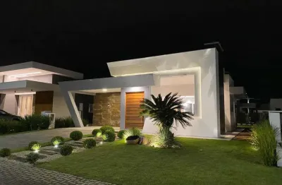 Casa em condomínio fechado com 3 quartos à venda na rua onório germano, 2009, araça, capão da canoa, 160 m2 por r$ 1.490.000