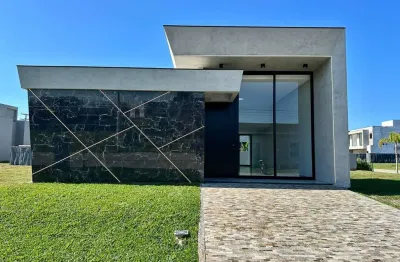 Casa em condomínio fechado com 4 quartos à venda na avenida paraguassu, 551, centro, xangri-lá por r$ 1.490.000