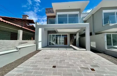 Casa com 3 quartos à venda na rua josé milton lopes, 363, zona nova, capão da canoa, 130 m2 por r$ 1.090.000