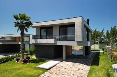 Casa em condomínio fechado com 5 quartos à venda na avenida paraguassu, 19, marina, xangri-lá por r$ 3.600.000