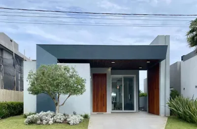 Casa em condomínio fechado com 4 quartos à venda na estrada do mar, 33, parque antártica, capão da canoa por r$ 2.090