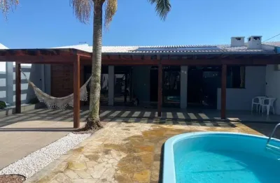 Casa com 4 quartos à venda na rua carlos trindade, e86, araça, capão da canoa por r$ 930.000