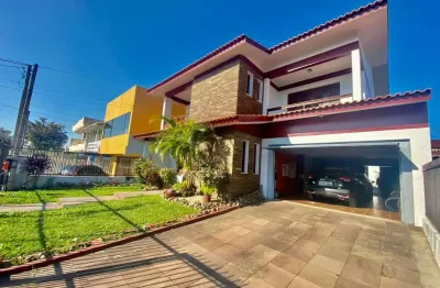 Casa com 5 quartos à venda na rua ceci, 2486, centro, capão da canoa, 389 m2 por r$ 1.500.000