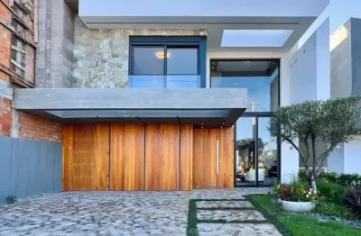 Casa em condomínio fechado com 4 quartos à venda na avenida paraguassu, 551, centro, xangri-lá por r$ 2.490.000