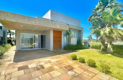 Casa em condomínio fechado com 4 quartos à venda na rua onório germano, 2009, araça, capão da canoa por r$ 1.200.000
