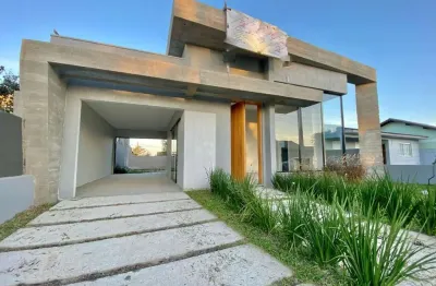 Casa com 3 quartos à venda na rua atum, 659, jardim beira mar, capão da canoa por r$ 880.000