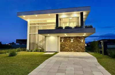 Casa em condomínio fechado com 4 quartos à venda na 1, 1, capão novo, capão da canoa por r$ 3.550.000