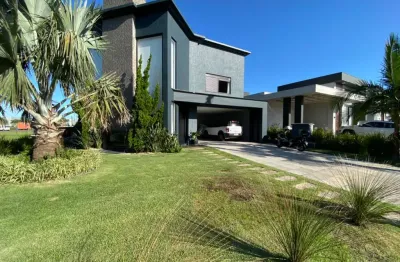 Casa em condomínio fechado com 4 quartos à venda na rua onório germano, 2009, araça, capão da canoa por r$ 2.300.000