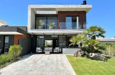 Casa em condomínio fechado com 4 quartos à venda na avenida paraguassu, 551, centro, xangri-lá por r$ 2.450.000