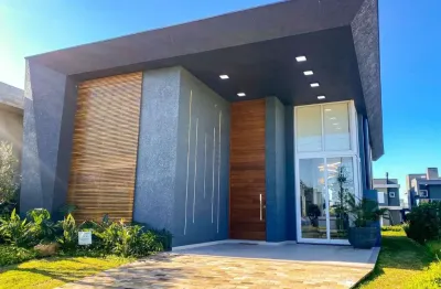 Casa em condomínio fechado com 4 quartos à venda na estrada do mar, 33, parque antártica, capão da canoa, 196 m2 por r$ 2.970.000