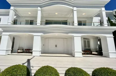 Casa em condomínio fechado com 4 quartos à venda na rua rio jacuí, 1331, atlântida, xangri-lá por r$ 17.900.000