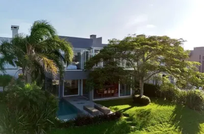 Casa em condomínio fechado com 5 quartos à venda na rua rio jacuí, 1331, atlântida, xangri-lá por r$ 5.800.000