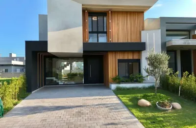 Casa em condomínio fechado com 4 quartos à venda na avenida paraguassu, 551, centro, xangri-lá por r$ 2.590.000