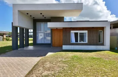 Casa em condomínio fechado com 4 quartos à venda na 1, 1, capão novo, capão da canoa por r$ 2.700.000