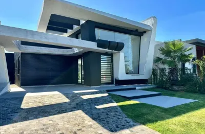 Casa em condomínio fechado com 3 quartos à venda na rua manoel quadros, 4, arroio teixeira, capão da canoa por r$ 1.390.000