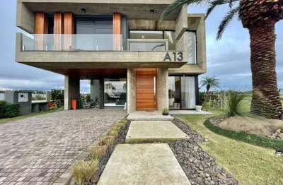 Casa em condomínio fechado com 5 quartos à venda na rio jacuí, 1366, centro, capão da canoa, 421 m2 por r$ 6.550.000