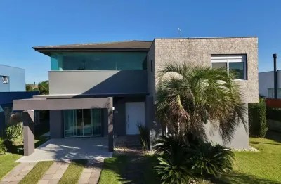 Casa em condomínio fechado com 5 quartos à venda na rio novo, 2083, xangri-lá, capão da canoa por r$ 2.490.000