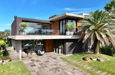 Casa em condomínio fechado com 5 quartos à venda na paraguassu, 11, xangri-lá, capão da canoa por r$ 5.900.000