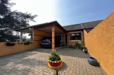 Casa 02 dormitórios à venda no bairro nova tramandaí com 69 m² de área privativa - 1 vaga de garagem