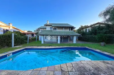 Casa em condomínio fechado com 3 quartos para alugar na avenida firmino octávio bimbi, 255, cavalhada, porto alegre, 400 m2 por r$ 7.900