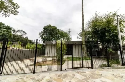 Casa em condomínio fechado com 3 quartos para alugar na Avenida Guarujá, 395, Guarujá, Porto Alegre, 155 m2 por R$ 3.100