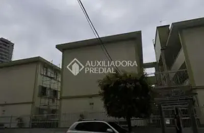 Kitnet / stúdio à venda na rua marajoara, 43, guilhermina, praia grande, 23 m2 por r$ 170.000
