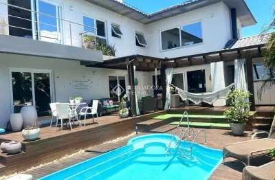 Casa em condomínio fechado com 4 quartos para alugar na rodovia doutor antônio luiz moura gonzaga, 3825, rio tavares, florianópolis, 340 m2 por r$ 22.000
